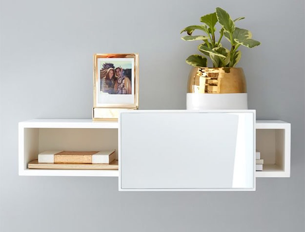 shelf with gold frame and plant