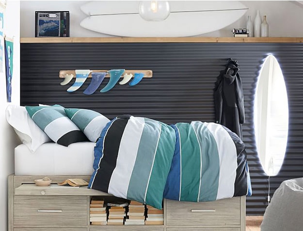 bedroom with surfboard fins