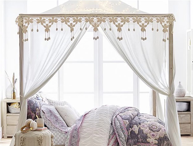 bed with a luxurious canopy