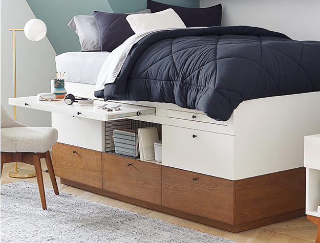 bed that has hidden storage and a pull out desk