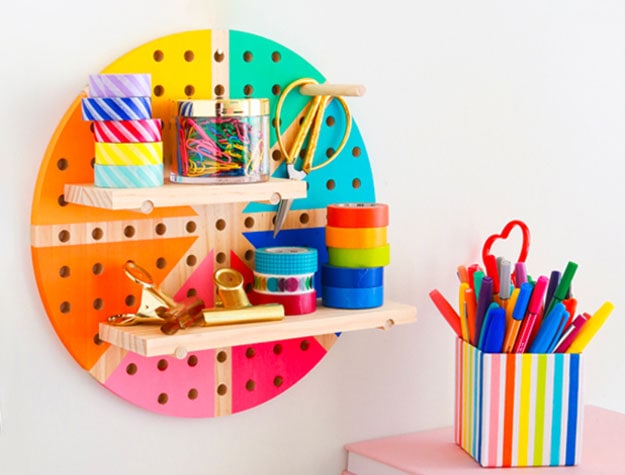 Colorful pegboard with craft supplies