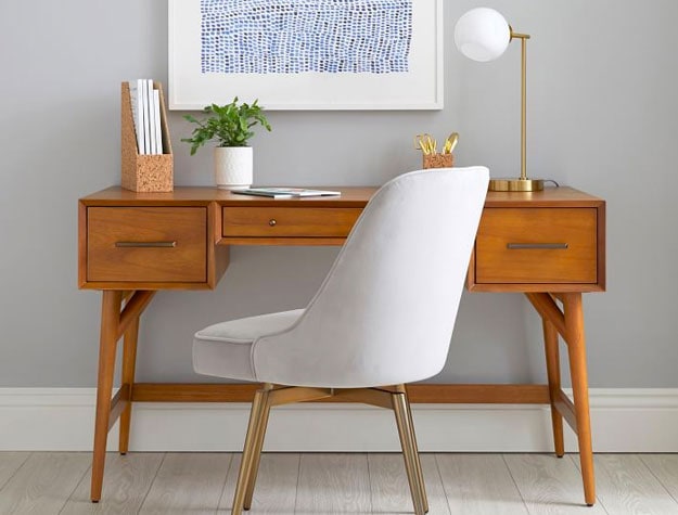 wooden mid-century modern desk with gray chair