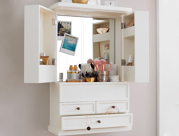 White beauty cabinet mounted on wall