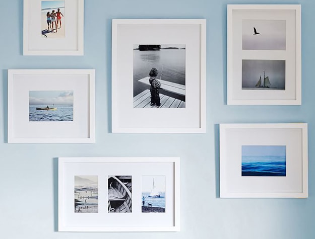 Wall with framed photo gallery
