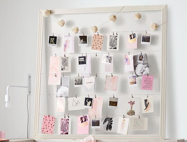 Photo collage board with wooden frame
