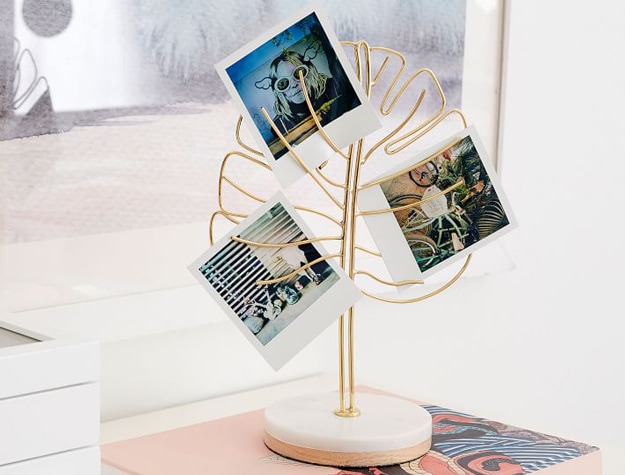 Gold and marble leaf-shaped photo display