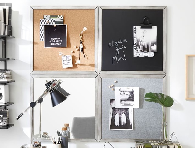 Industrial-style photo displays above desk