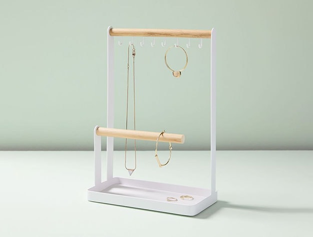 Small white jewelry stand with hooks