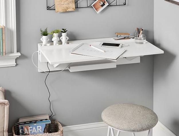 USB-folding wall desk with notebook.