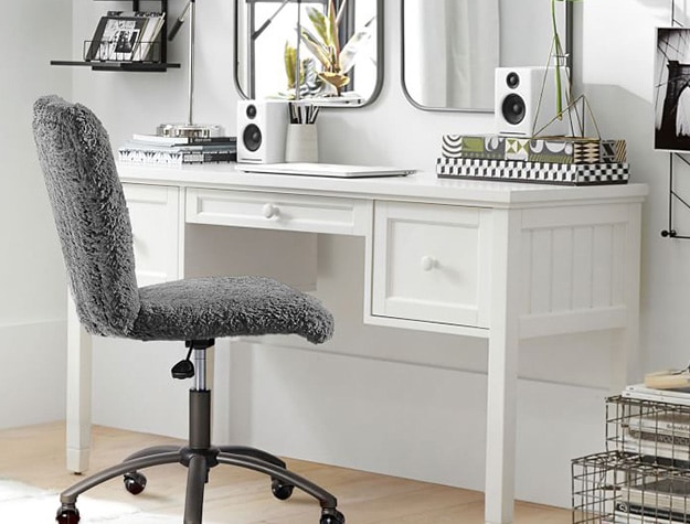 White beadboard smart small space storage desk with chair.