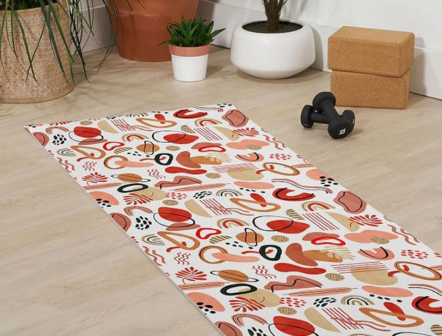 Pattern yoga mat with exercise items.