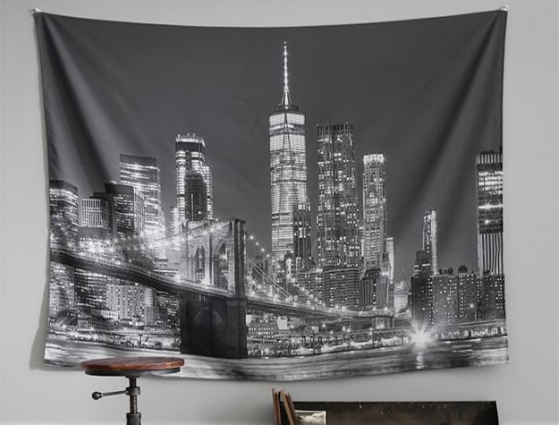 Black and white city landscape tapestry.