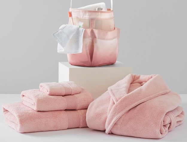 Ombre blush recycled classic shower caddy bath bundle set, including a set of pink towels and a plush bathrobe.