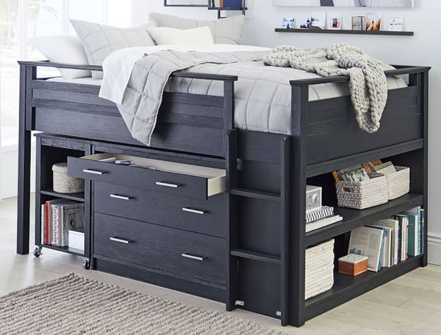 Sleep & Study low loft bed in weathered navy styled with a light gray comforter.
