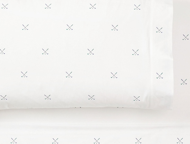 a set of sheets with a design resembling two golf clubs