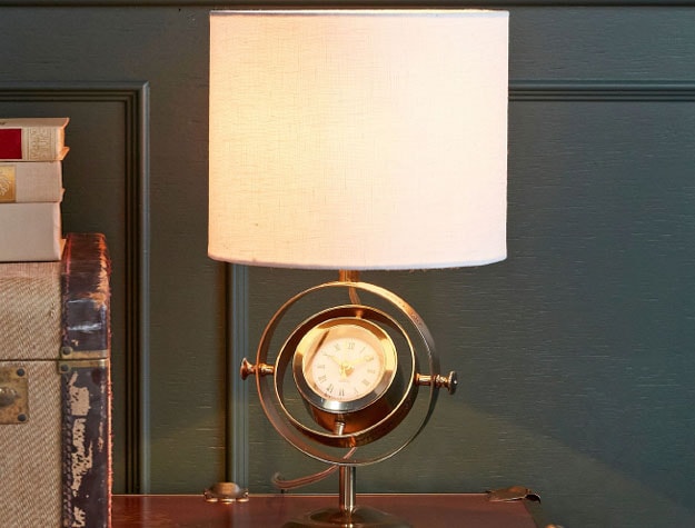 A Time-Turner lamp on top of a desk.