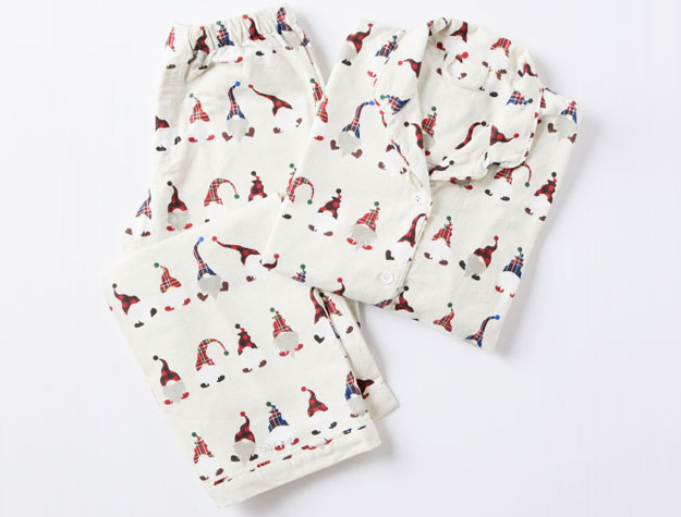 White holiday pajamas with a gnome design.