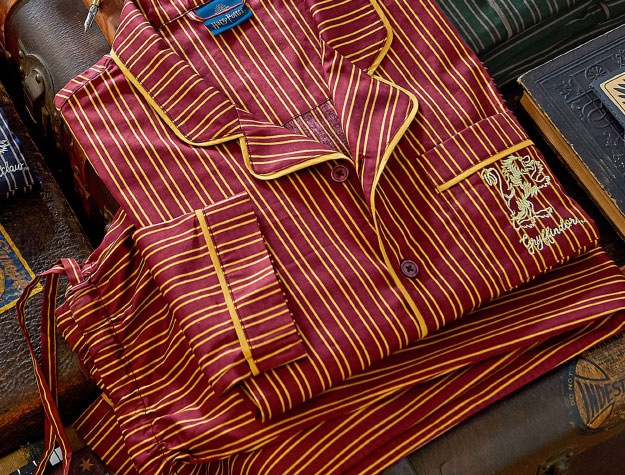 A set of Gryffindor pajamas folded neatly.