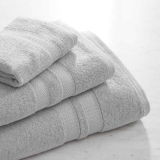 Grey plush terry bath towel. 