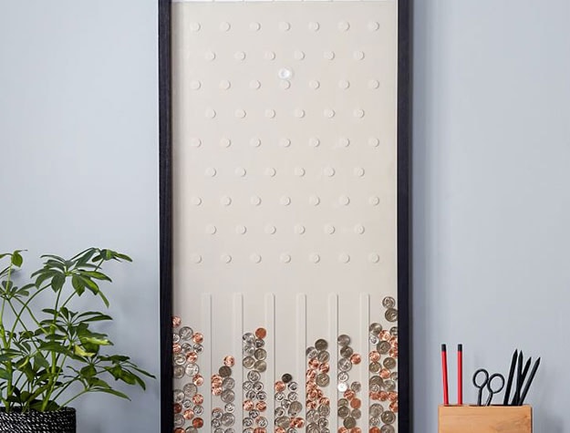 Disc drop wall piggy bank