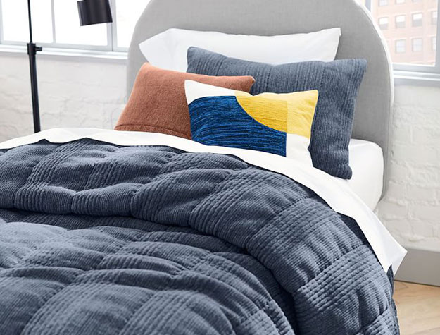 colorful textiles on bed