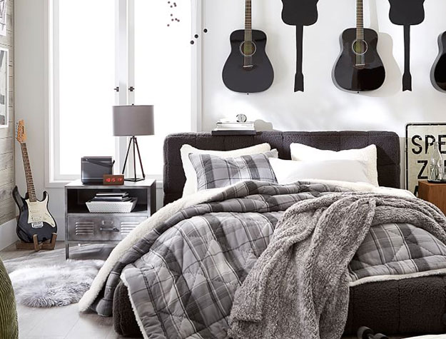 guitars hanging in bedroom