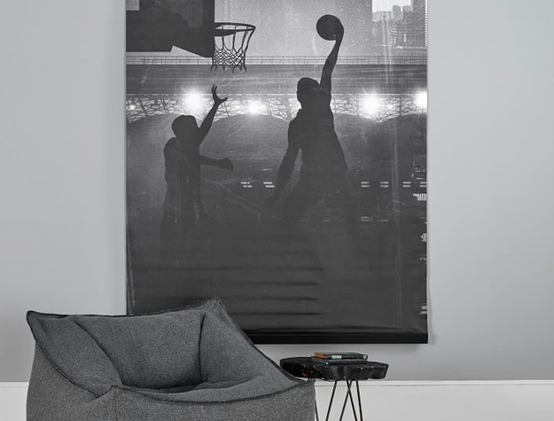 black and white basketball poster on wall