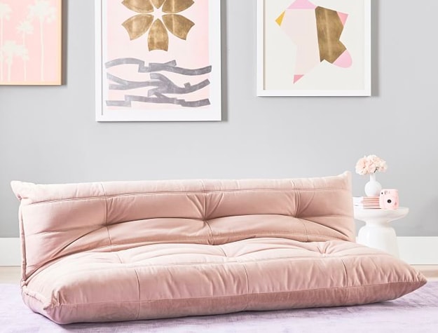 pink overstuffed sofa with pink accents