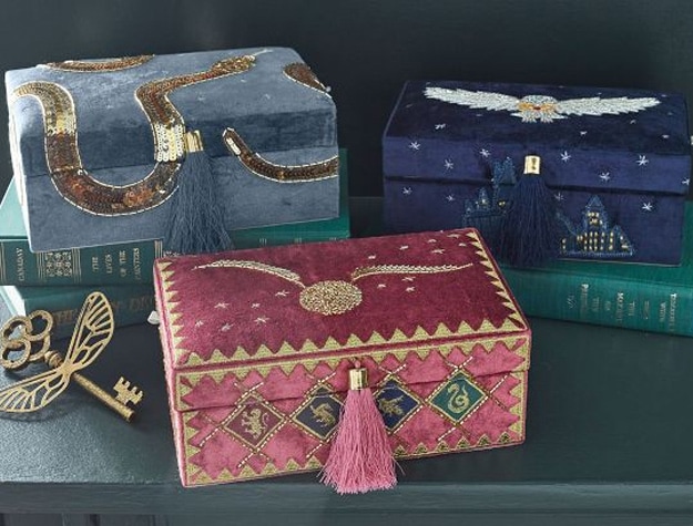 Velvet jewelry boxes feature different Harry Potter patterns, from Nagini to Hedwig to the Golden Snitch.