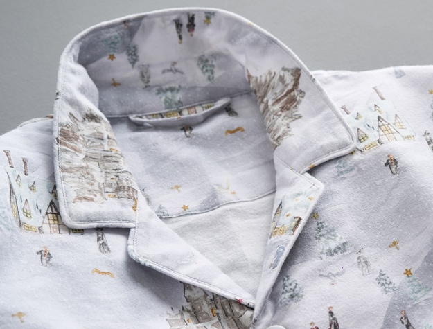 These flannel pajamas feature the Hogwarts castle amidst a snowy scene.
