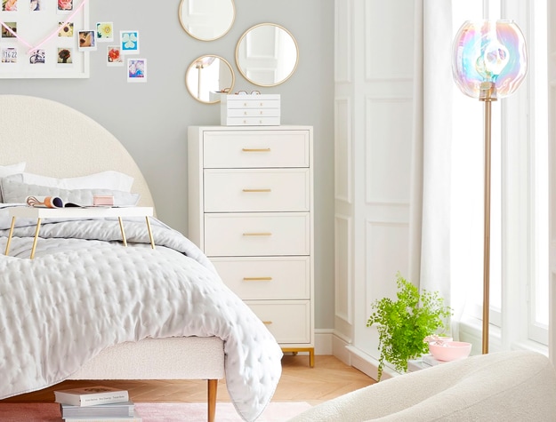 Iridescent Globe Floor Lamp next to a window in a bedroom.