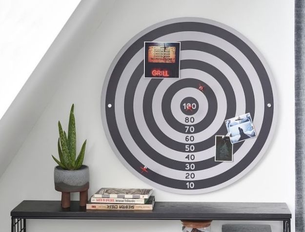 Dart board hung on wall