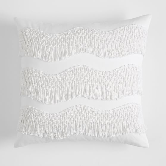 white fringe pillow