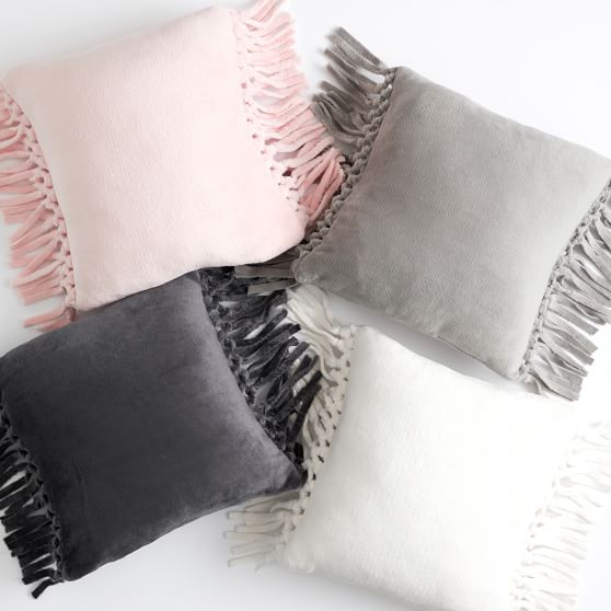 grey fringe pillow