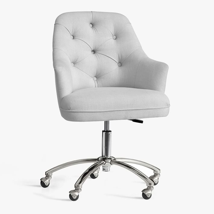 white tufted swivel chair