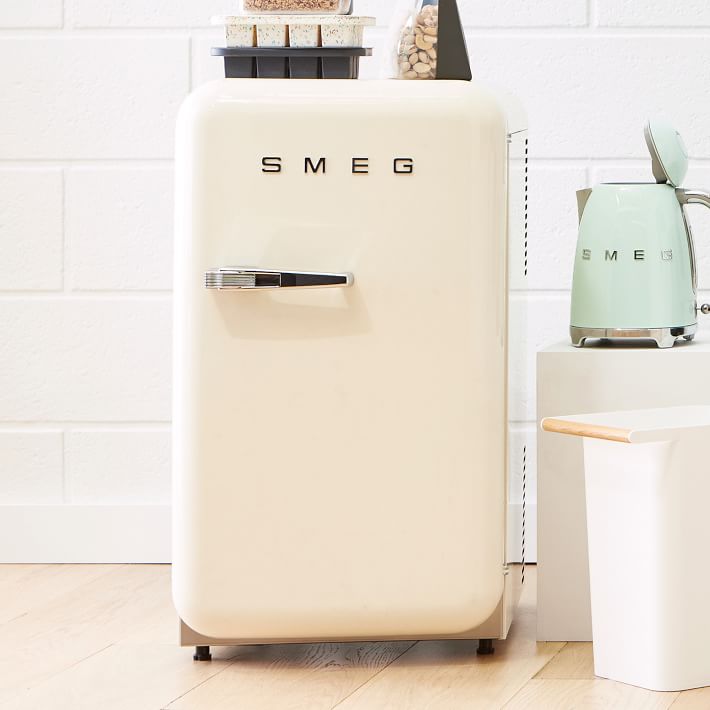 A retro mini fridge made to look like an SMEG refrigerator