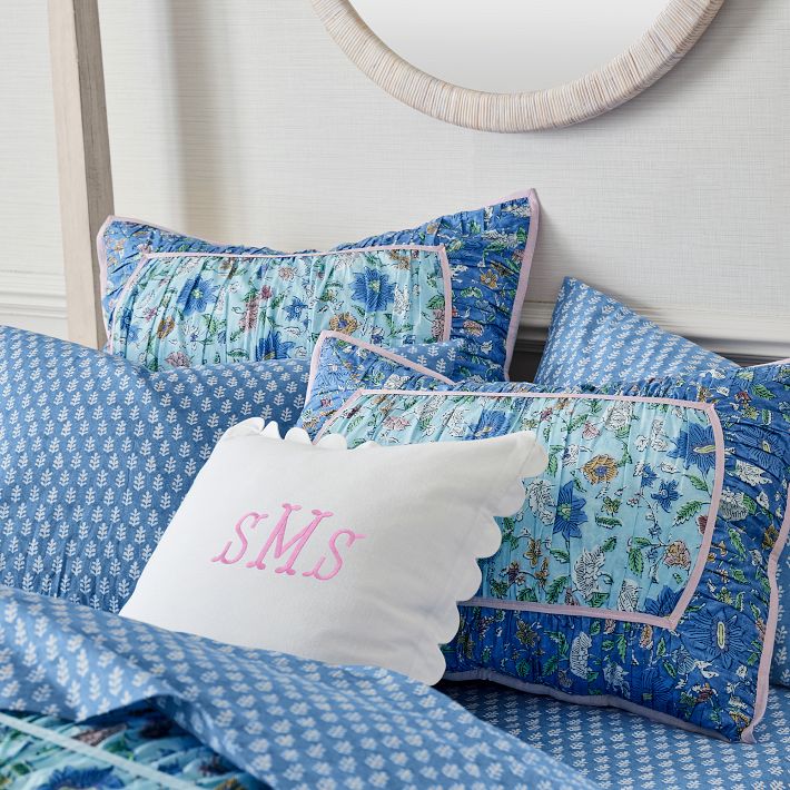 https://assets.ptimgs.com/ptimgs/ab/images/dp/wcm/202331/0064/chambray-scallop-pillow-cover-o.jpg