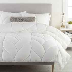 https://assets.ptimgs.com/ptimgs/ab/images/dp/wcm/202339/0006/puffy-comforter-h.jpg