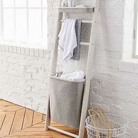 Towel rack best sale with laundry basket