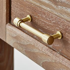 The Classic Passage Set in Polished Brass with Rice Door Knobs