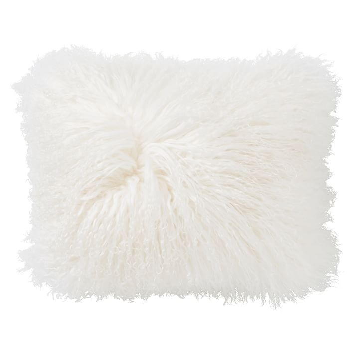 White top furry pillows