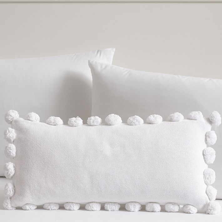 Pom pom throw outlet pillow