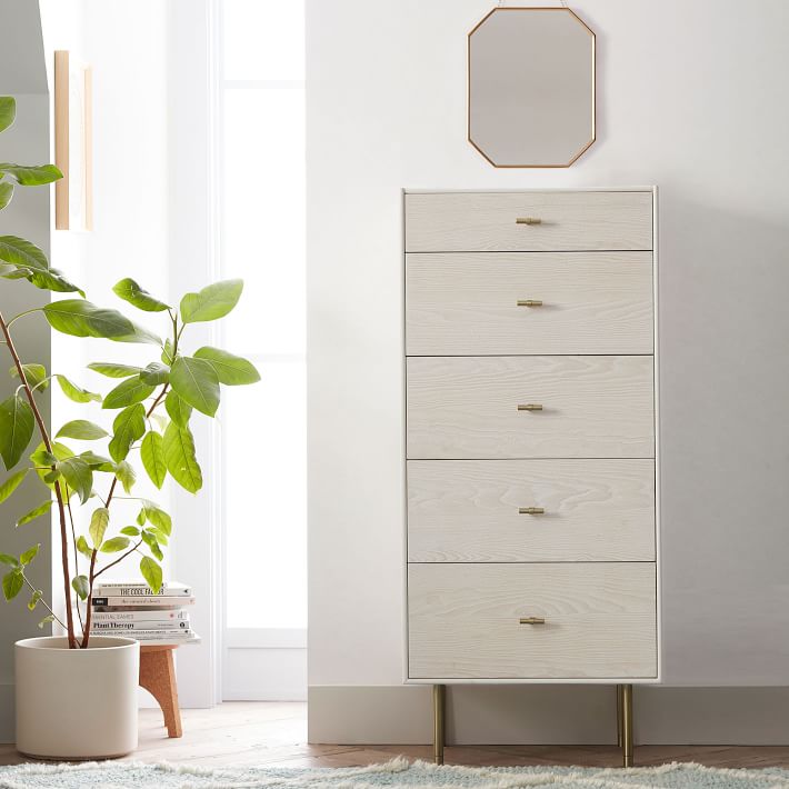 https://assets.ptimgs.com/ptimgs/ab/images/dp/wcm/202351/0011/west-elm-x-pbt-modernist-4-drawer-tall-dresser-with-jewell-1-o.jpg