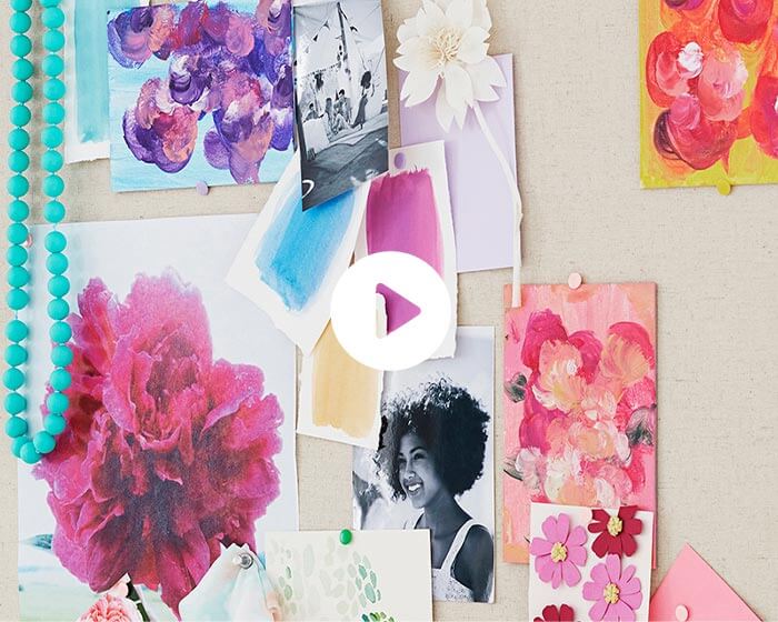 Bulletin board of swatches and floral art