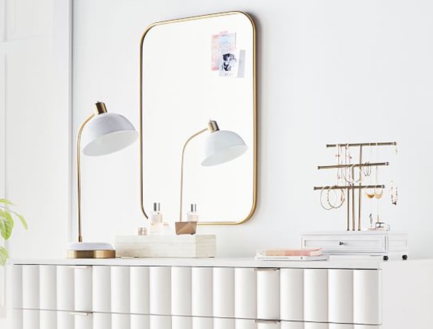 minimalistic white dresser and accessories