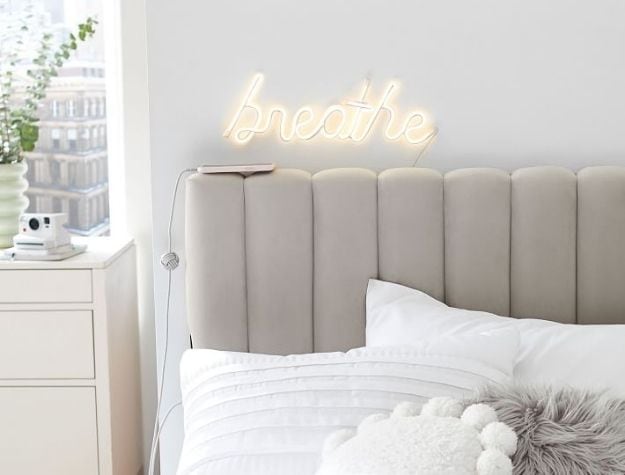 faux headboard and neon light