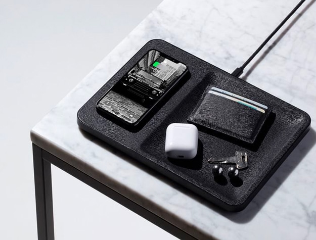 Black wireless charger on table