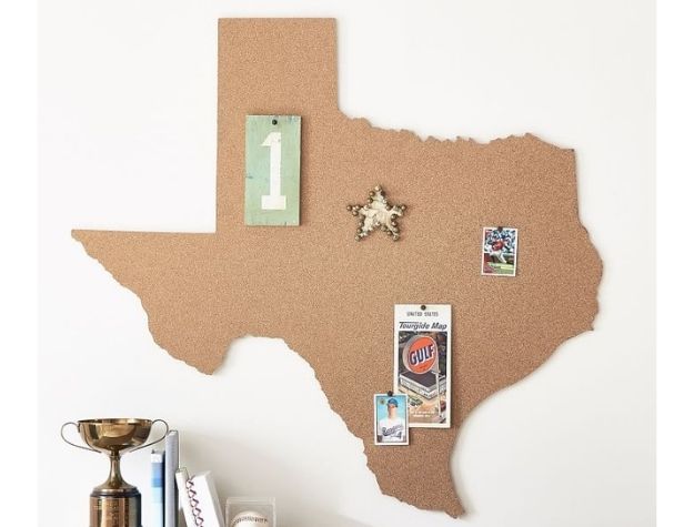 Texas shaped cork board on wall