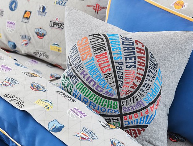 Sports league all team NBA pillow on bed with matching sheets 