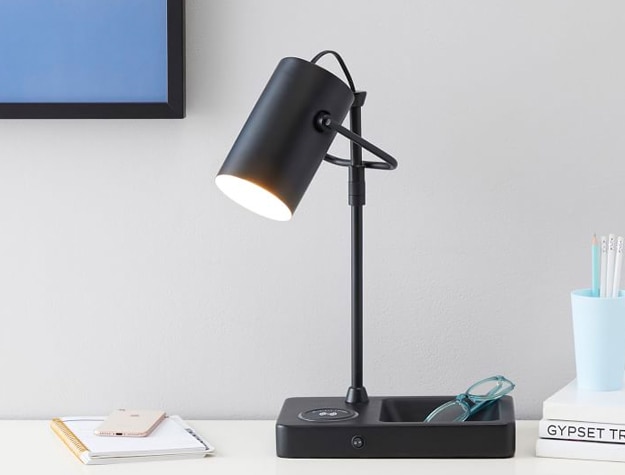 Black Catchall Wireless Charging Lamp on a desk.